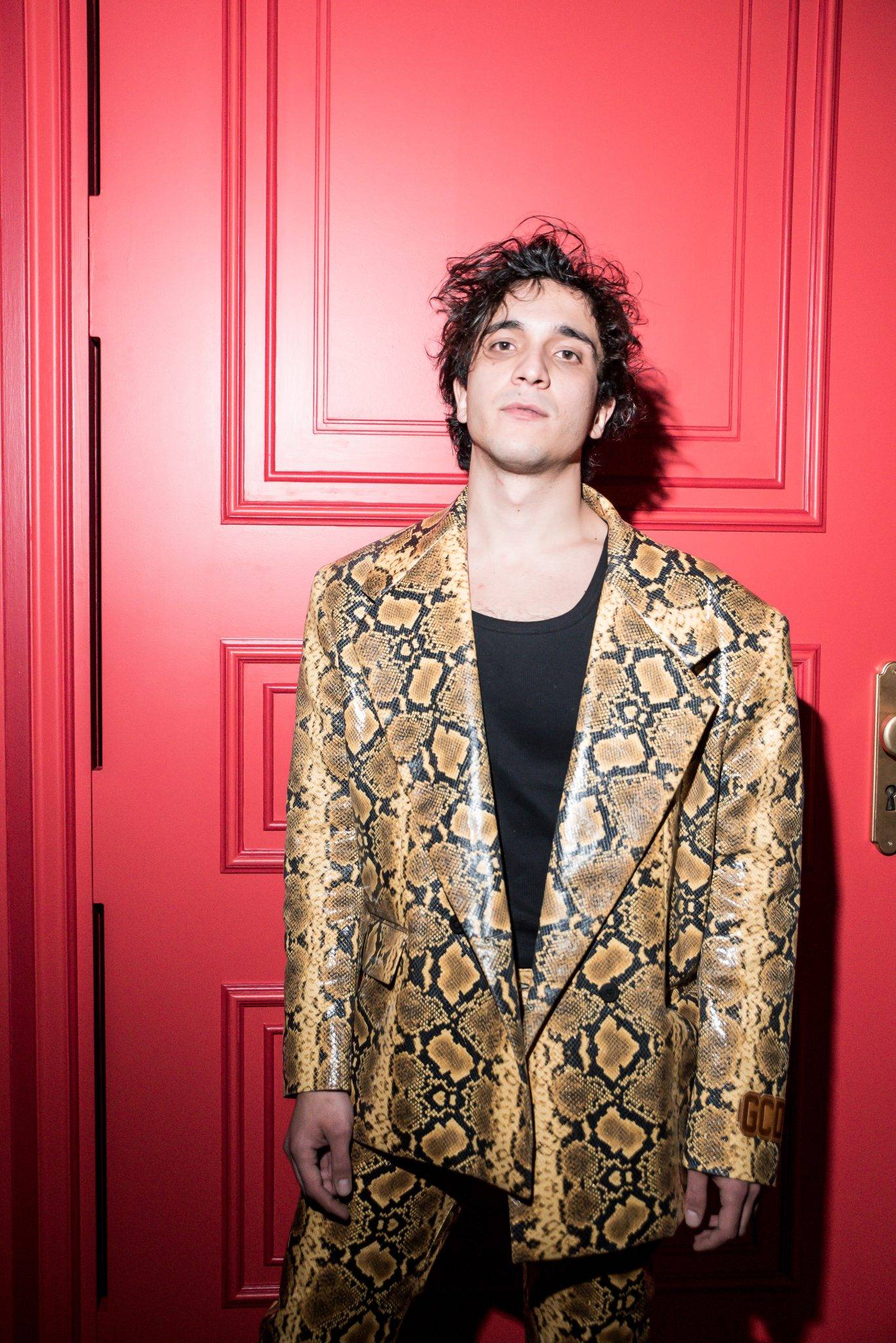  - Bianca Balti, Symone and Gigi Goode sit front row at GCDS Fall/Winter 2022-23